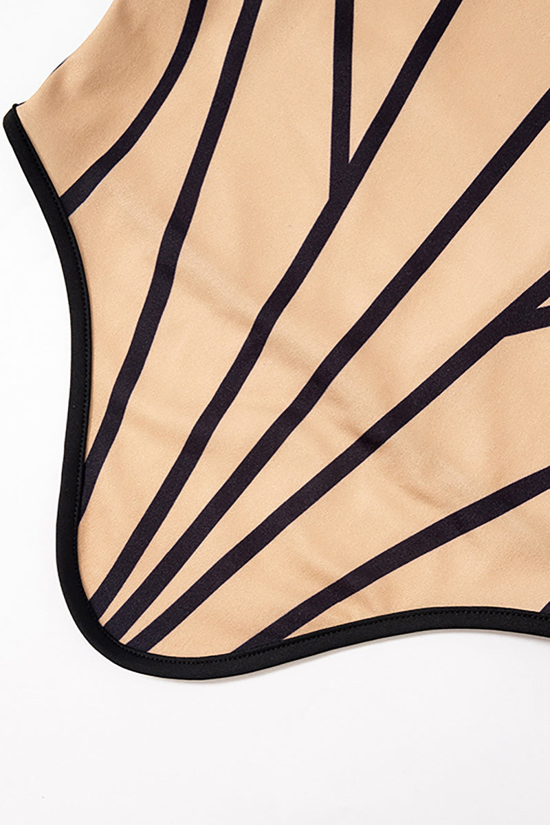 Close-up of the tan fabric with black geometric lines on a corset.