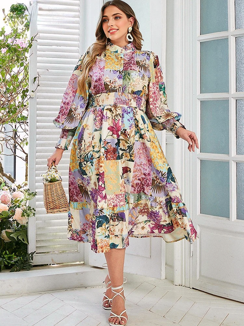 A woman holds a small woven basket while wearing a floral print dress with bishop sleeves and a smocked waist.