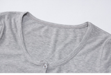 Close-up of the neckline of a grey ribbed long-sleeve crop top