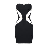 A black strapless mini dress with cut-out details and gold hardware, shown flat against a white background.