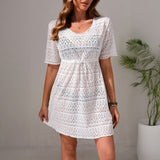 woman wearing a white lace cover-up dress
