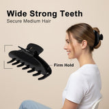 A woman is shown with a black claw hair clip holding her hair up in a ponytail. Text indicates 'Wide Strong Teeth' and 'Firm Hold'.