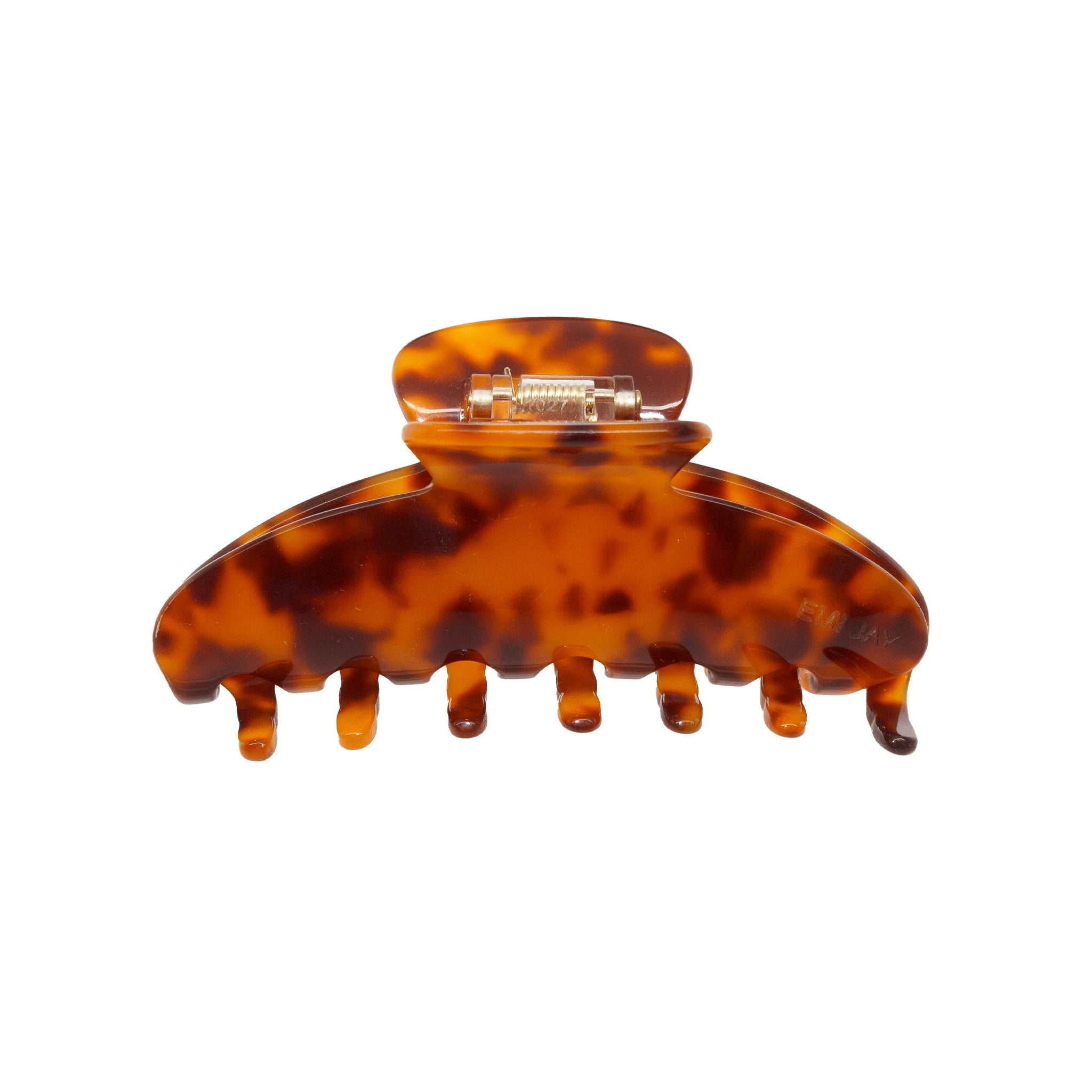 A close-up shot of a tortoiseshell claw clip against a white background.