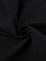 Close-up of black fabric with a textured weave.