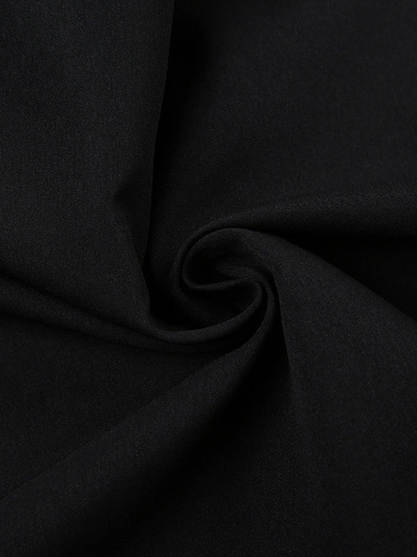 Close-up of black fabric with a textured weave.