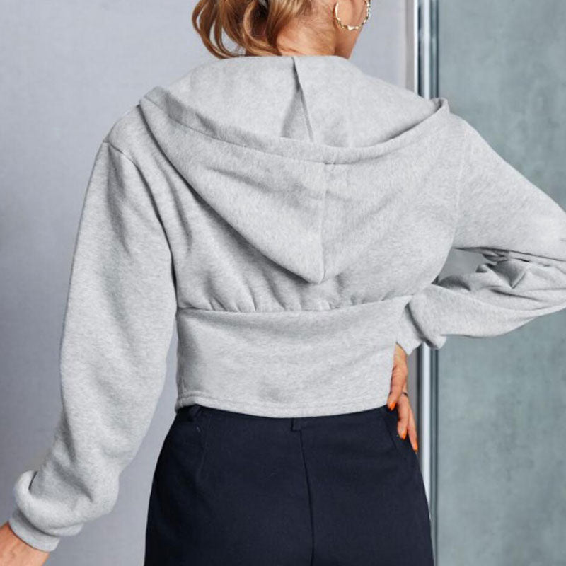 woman in gray hoodie