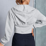 woman in gray hoodie