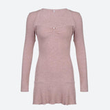 front view of a pink ribbed knit dress