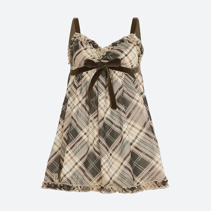 A brown and beige plaid babydoll dress with ruffled trim and a velvet bow, shown flat.