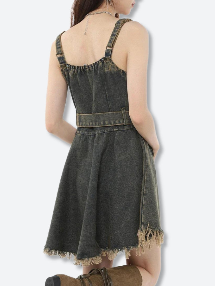 Back view of a black denim dress with a frayed hem