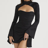 model in a black satin dress with bell sleeves and a cut-out neckline