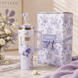 Stanley Blue Violet Blossom 40oz Insulated Tumbler with floral design and matching ribbon gift box - View 1 | Clistos