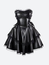A black strapless leather-like dress with lace trim and a layered skirt, displayed against a white background.