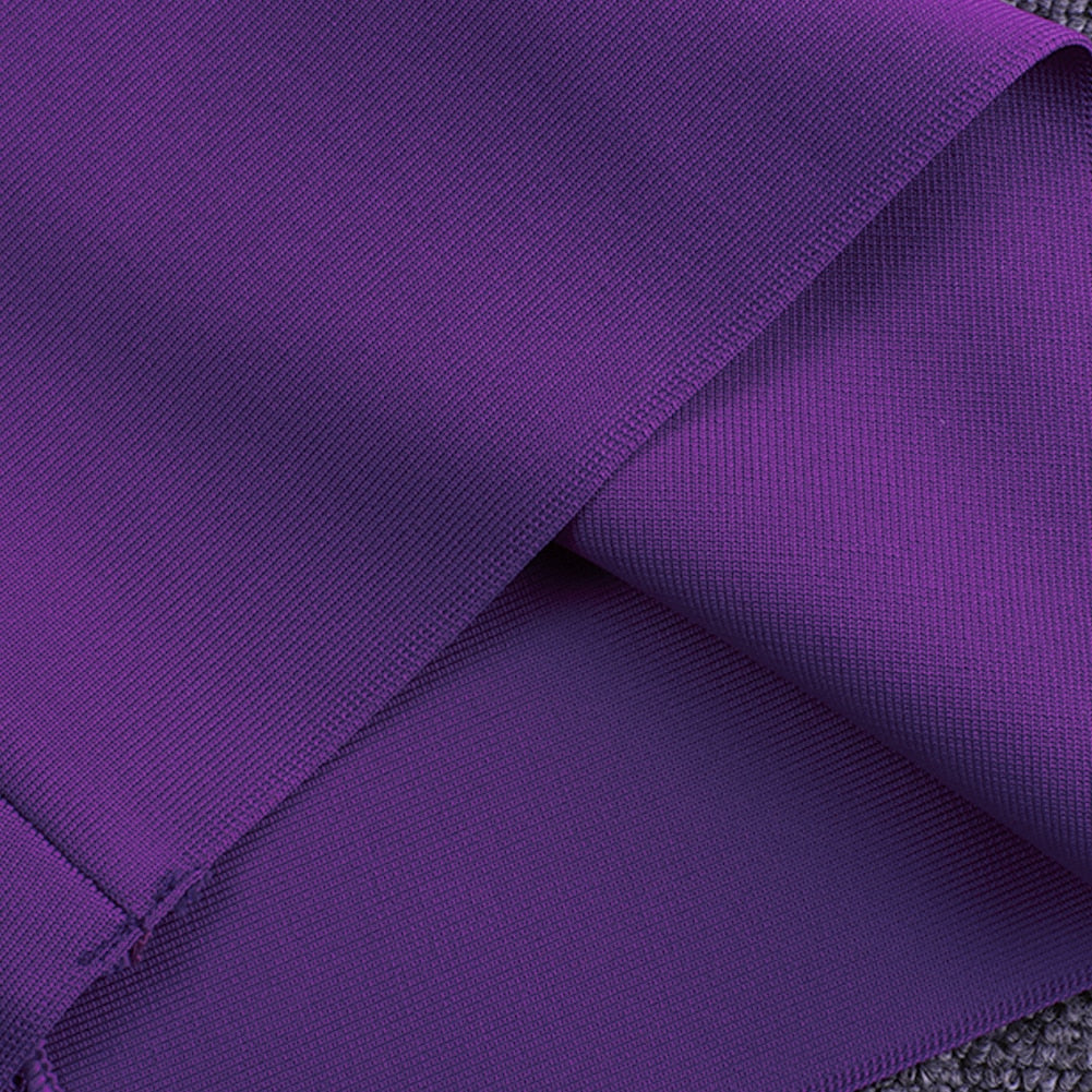 Close-up of the textured purple fabric of the dress