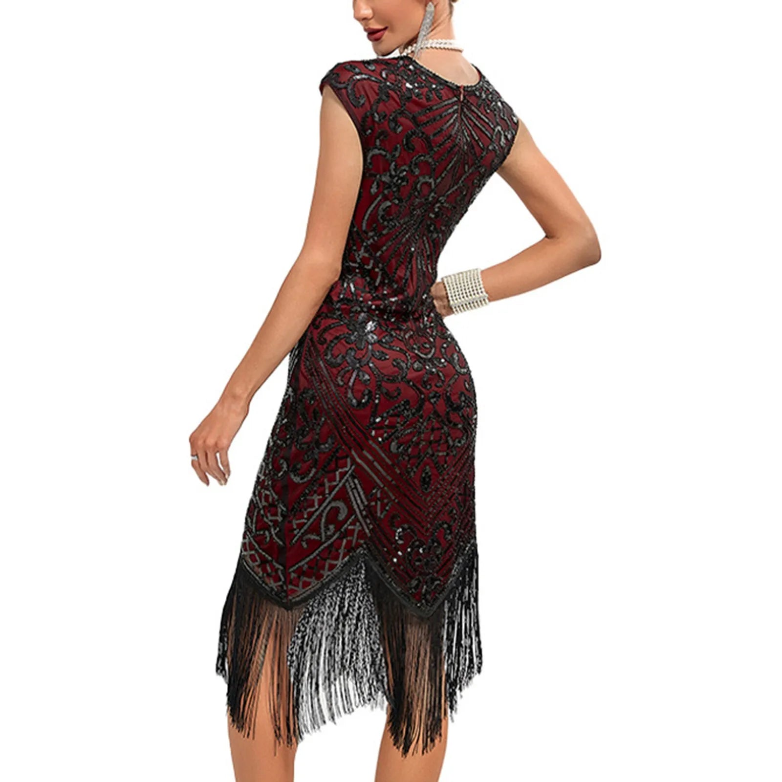 back view of a red flapper dress with black beading and fringe
