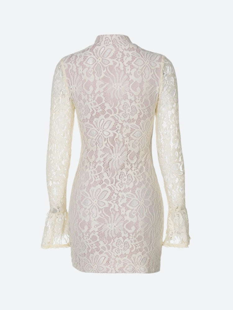 white lace dress with a keyhole neckline and bell sleeves, back view