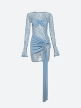 A light blue lace dress with long sleeves, a bow detail on the bust, and a ruched asymmetrical hem.
