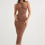 Woman wearing a brown ruched one-shoulder midi dress with cut-out detail