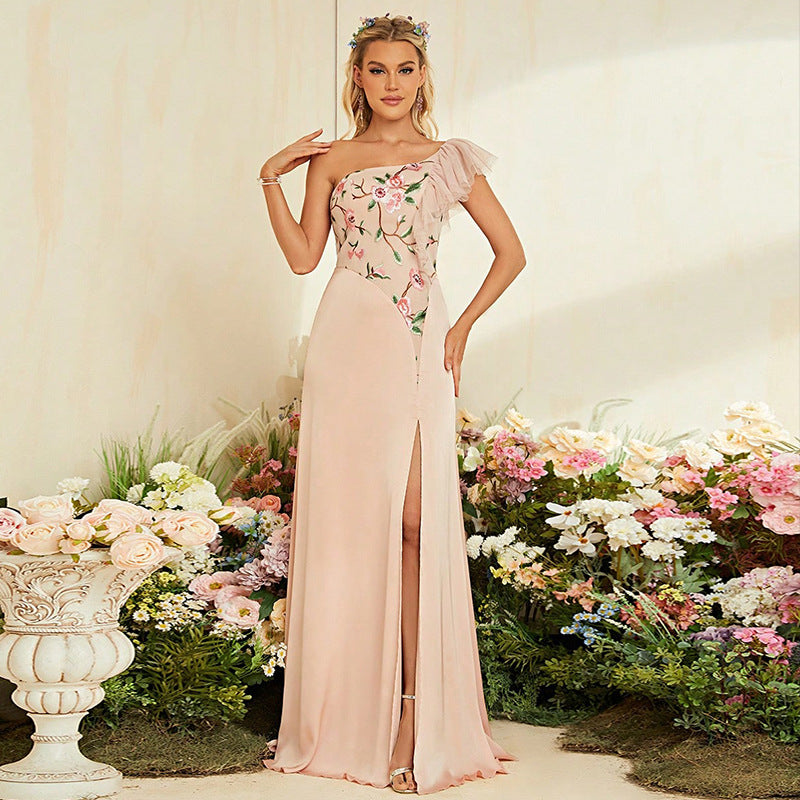 Close-up of the floral embroidery on the gown