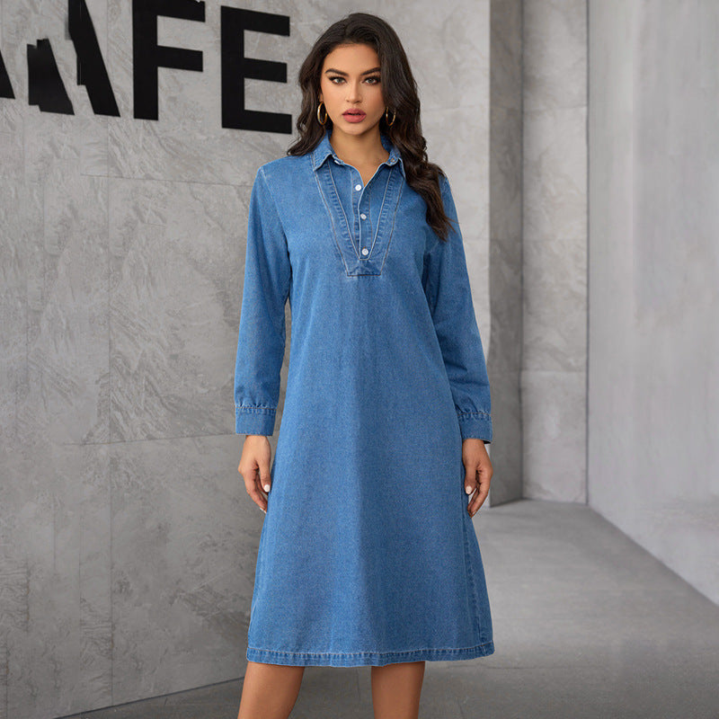 Full shot of a woman in a blue denim dress.