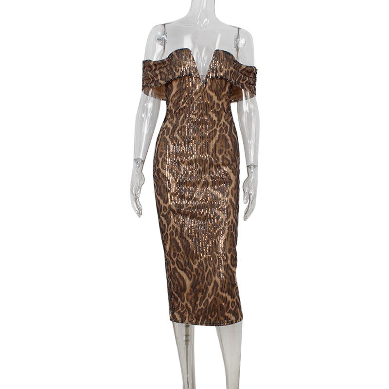 A leopard print sequined off-the-shoulder dress on a mannequin.