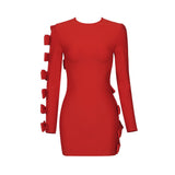 A red mini dress with long sleeves and cut-out details adorned with bows.
