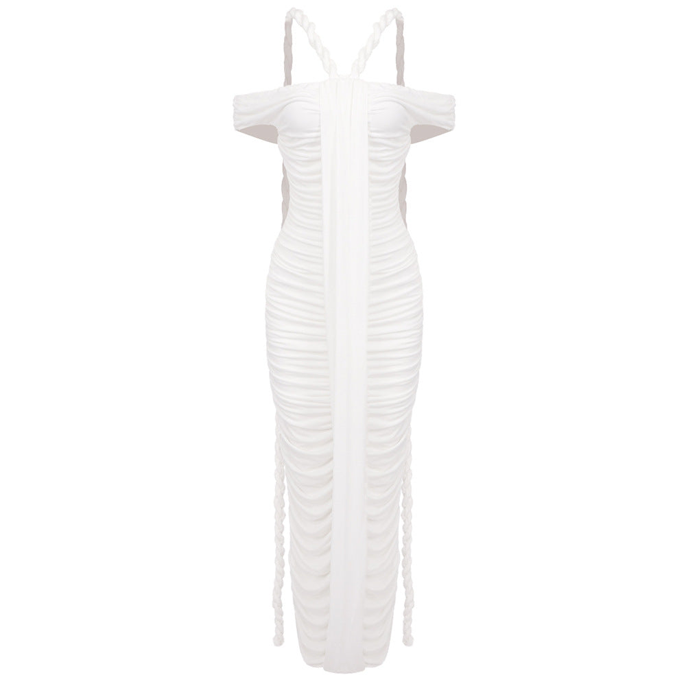 A white ruched gown with off-the-shoulder sleeves and halter neck straps, featuring a long braided rope detail.