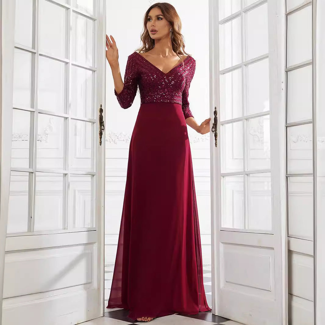 woman in a burgundy sequined dress