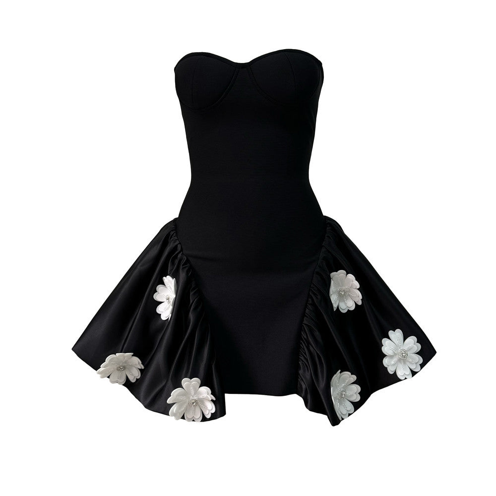 black strapless dress with white floral embellishments