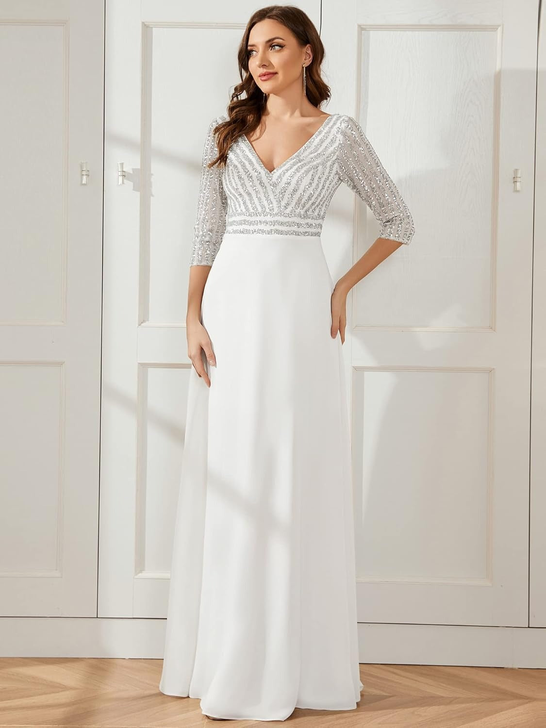 woman in a white sequined dress