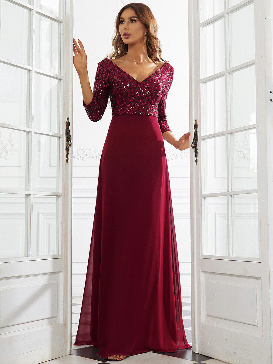 woman in a burgundy floor-length gown