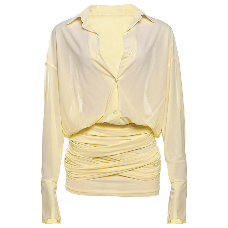 A pale yellow sheer dress with a ruched body and a button-up shirt top.
