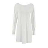 white long-sleeved mini dress laid flat