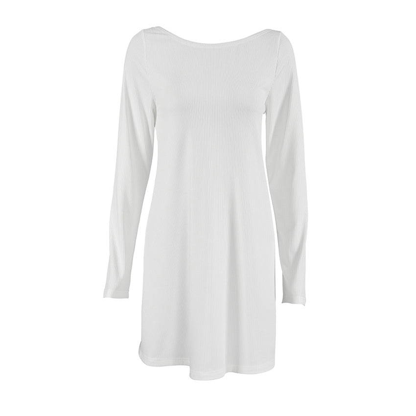 white long-sleeved mini dress laid flat