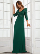 woman in a green sequined dress