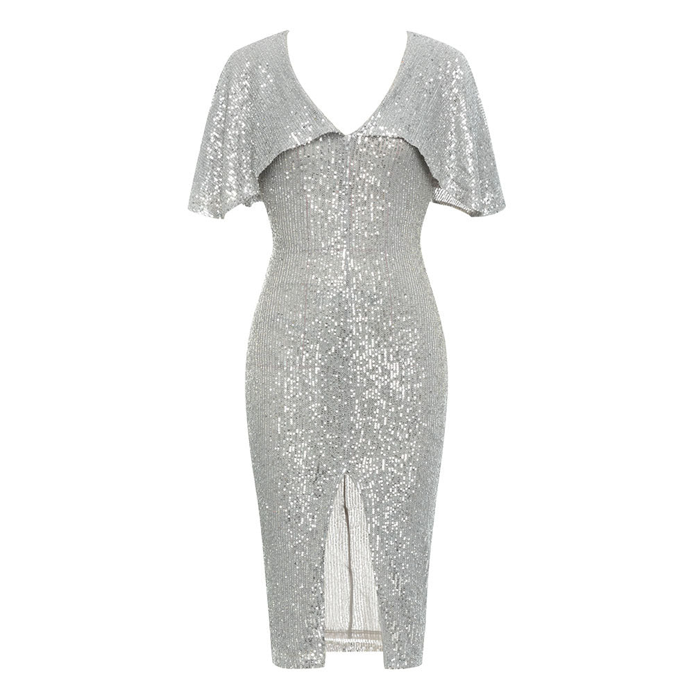 silver sequined dress with a v-neck and slit