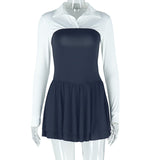 A black and white dress on a mannequin.