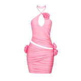 pink halter dress with a keyhole cutout and ruched detailing
