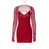 A red lace mini dress with long sleeves on a mannequin
