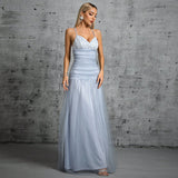 woman in a light blue floor-length dress