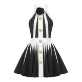 black and white halter dress with a pleated skirt and gold buttons