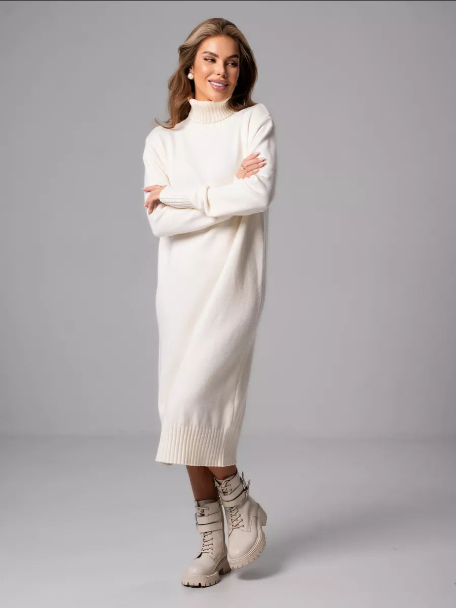 woman wearing a white turtleneck knit midi dress with white boots