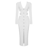 A white midi dress with long sleeves, a v-neck, cut-outs, button details, and a high slit, displayed on a white background.