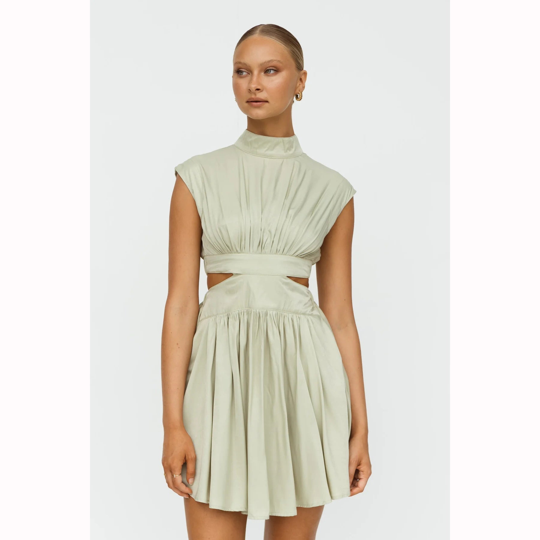 woman in light green dress