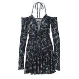 short dress with a camouflage print and long sleeves