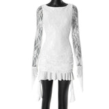 Mannequin displaying a white lace mini dress with long sleeves, ruched detailing, and ruffled trim