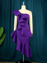 Purple one-shoulder dress with ruffles and asymmetrical hem on a mannequin