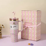 Stanley Blush Lilac Floral 40oz insulated tumbler with matching pastel gift box and bow straw topper - View 3 | Clistos