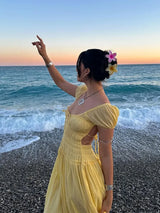 Elegant yellow backless maxi dress with puff sleeves and smocked bodice - View 6 | Clistos