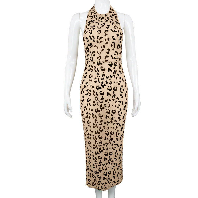 A beige and black leopard print halter dress on a mannequin.